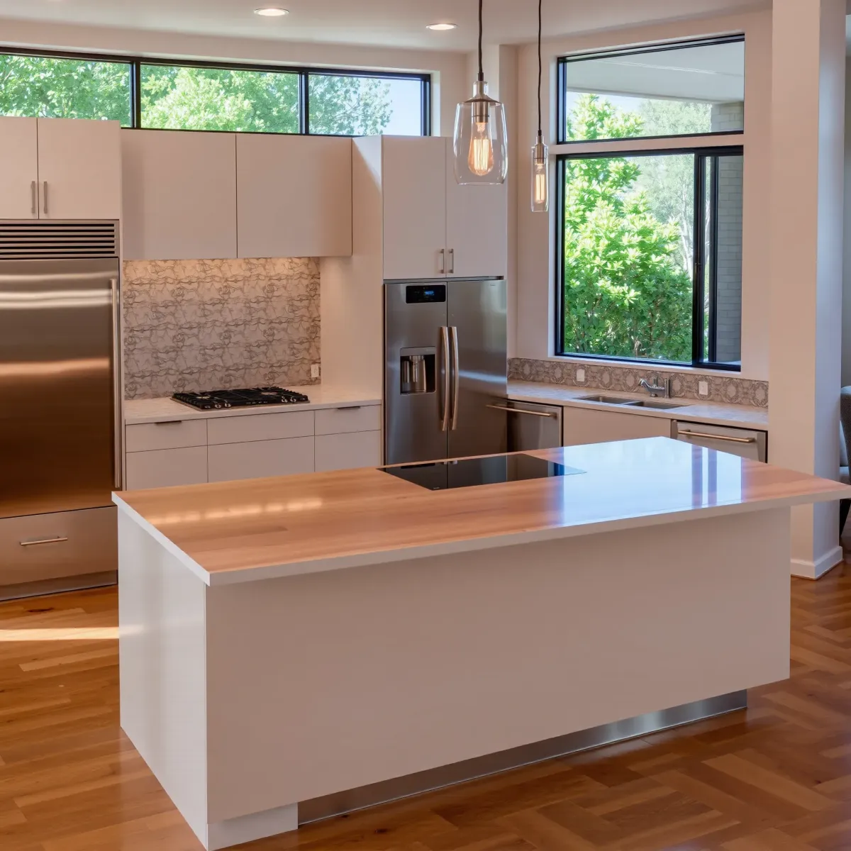 Remodeled Rancho Santa Margarita kitchen with modern cabinetry, quartz countertops, stainless appliances, and natural light.