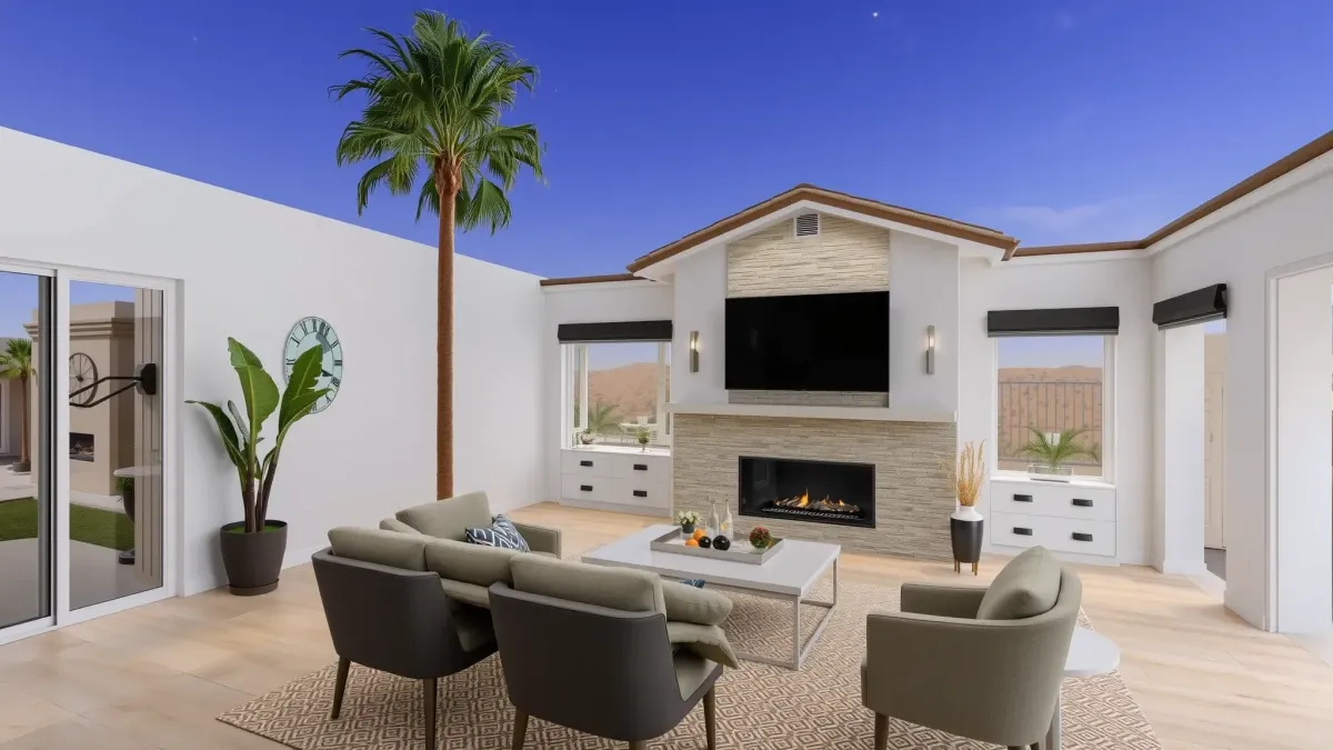Modern Laguna Beach living room with ocean views, sleek furniture, hardwood floors, stylish decor, and seamless outdoor patio.