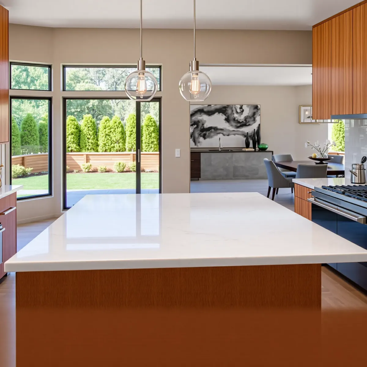 North Tustin CA kitchen renovation with modern cabinetry, sleek countertops, and stylish lighting fixtures.