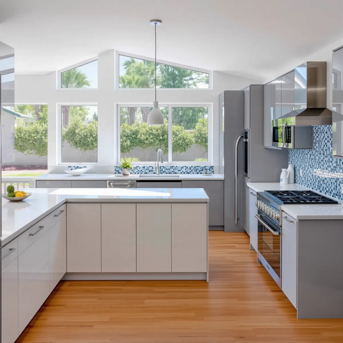 Renovated East Garden Grove kitchen with modern cabinetry, granite counters, stainless appliances, and large windows.