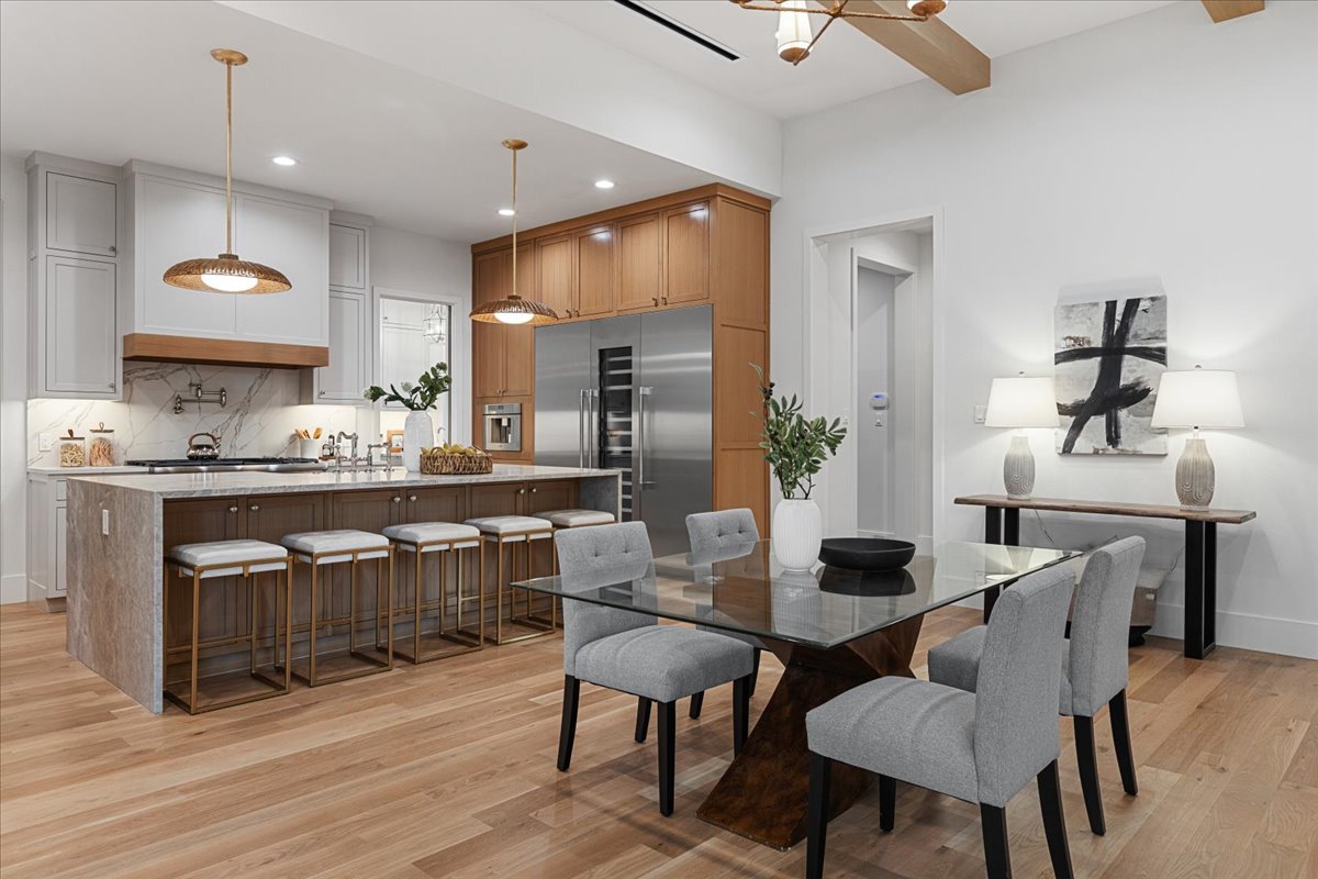Spacious luxury kitchen featuring a modern backsplash and elegant staging that highlights the room’s size and design, styled by Model My Home—Dallas Fort Worth home staging experts.