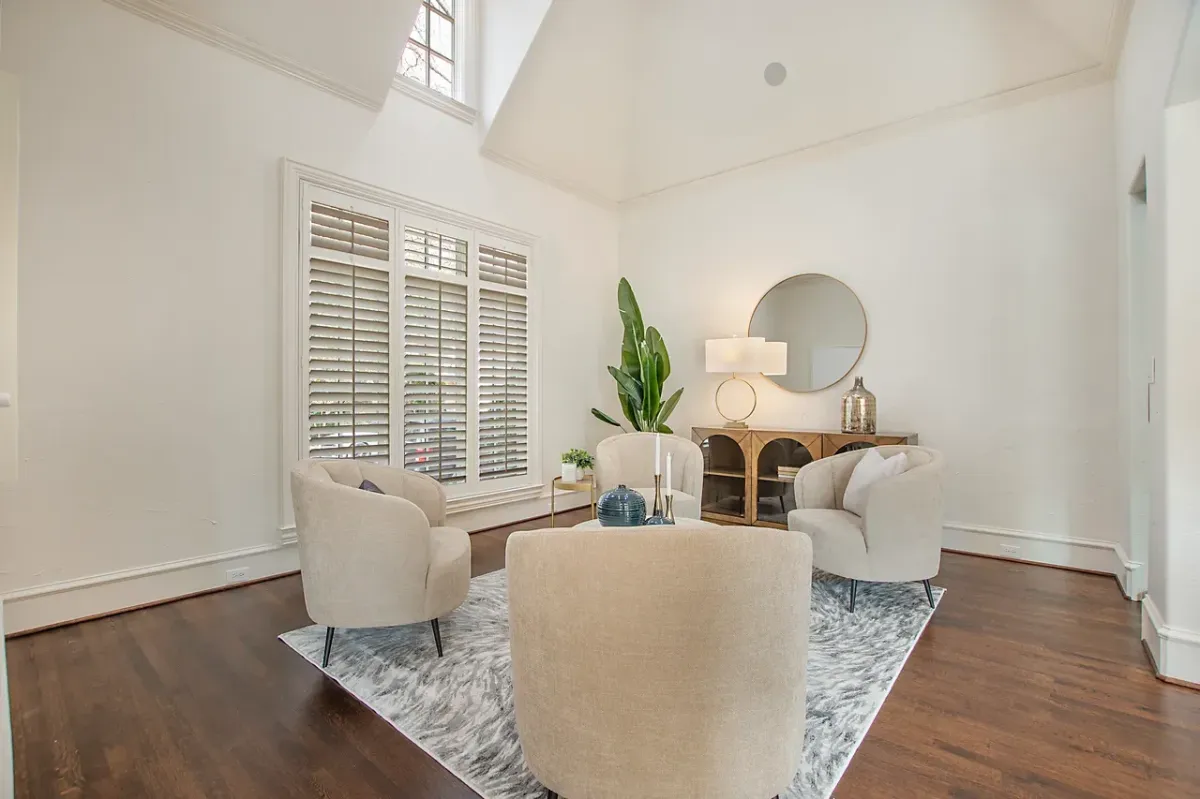 Elegant formal sitting room with sophisticated décor and refined staging, professionally designed by Model My Home—Dallas Fort Worth home staging and interior design experts.