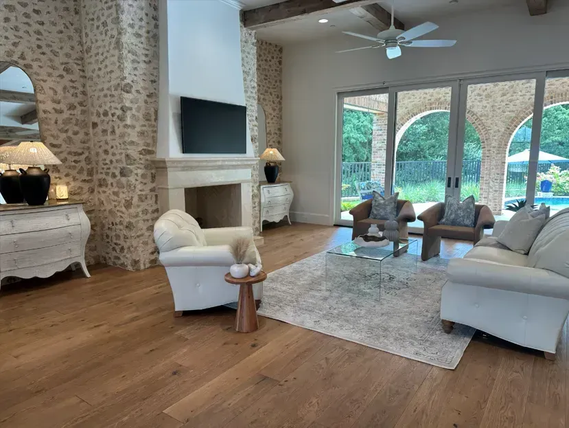 Occupied staged living room featuring a mix of the homeowner’s furniture with Model My Home’s accessories and professional arrangement—Dallas Fort Worth home staging experts.