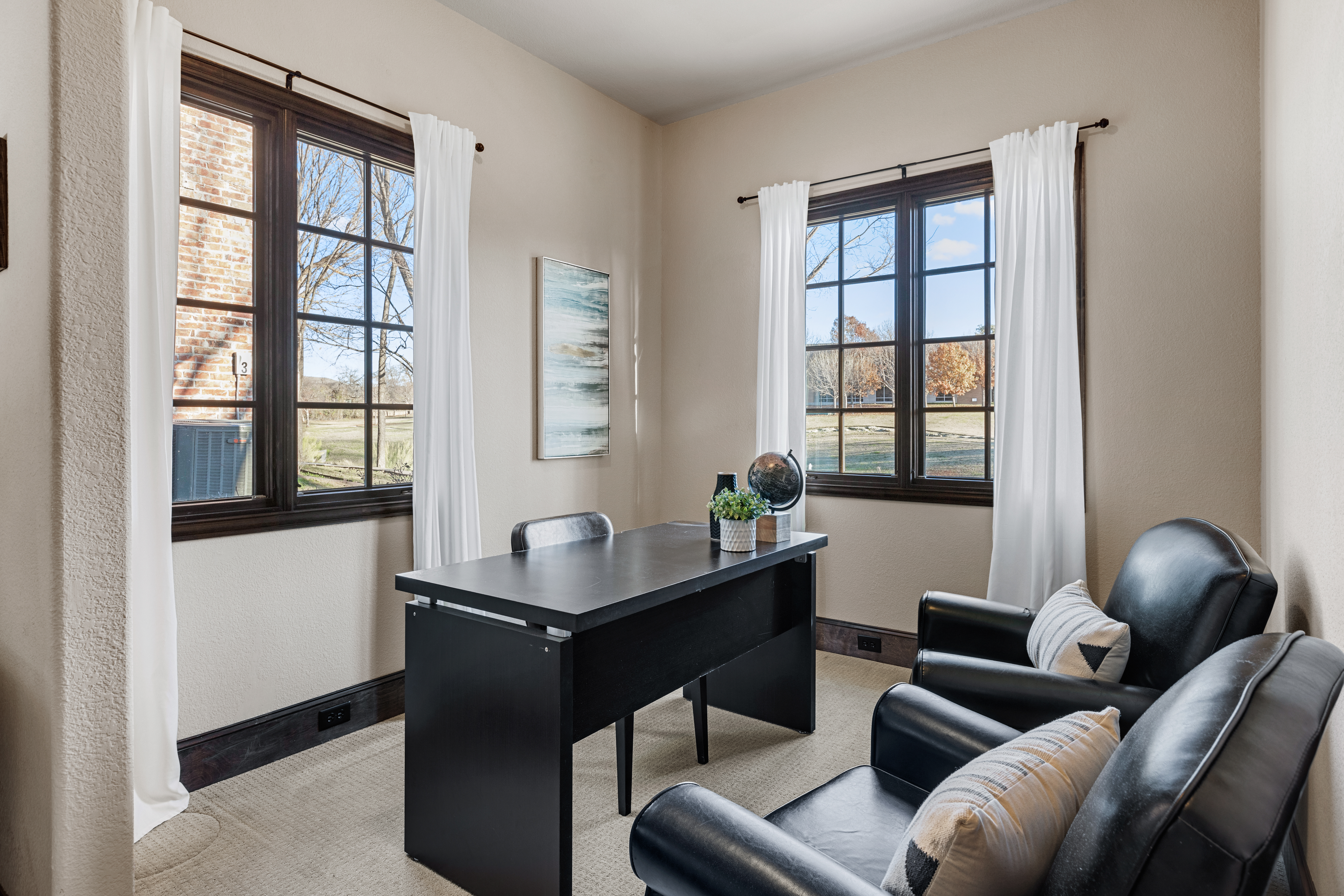 Bright office with dark furiture