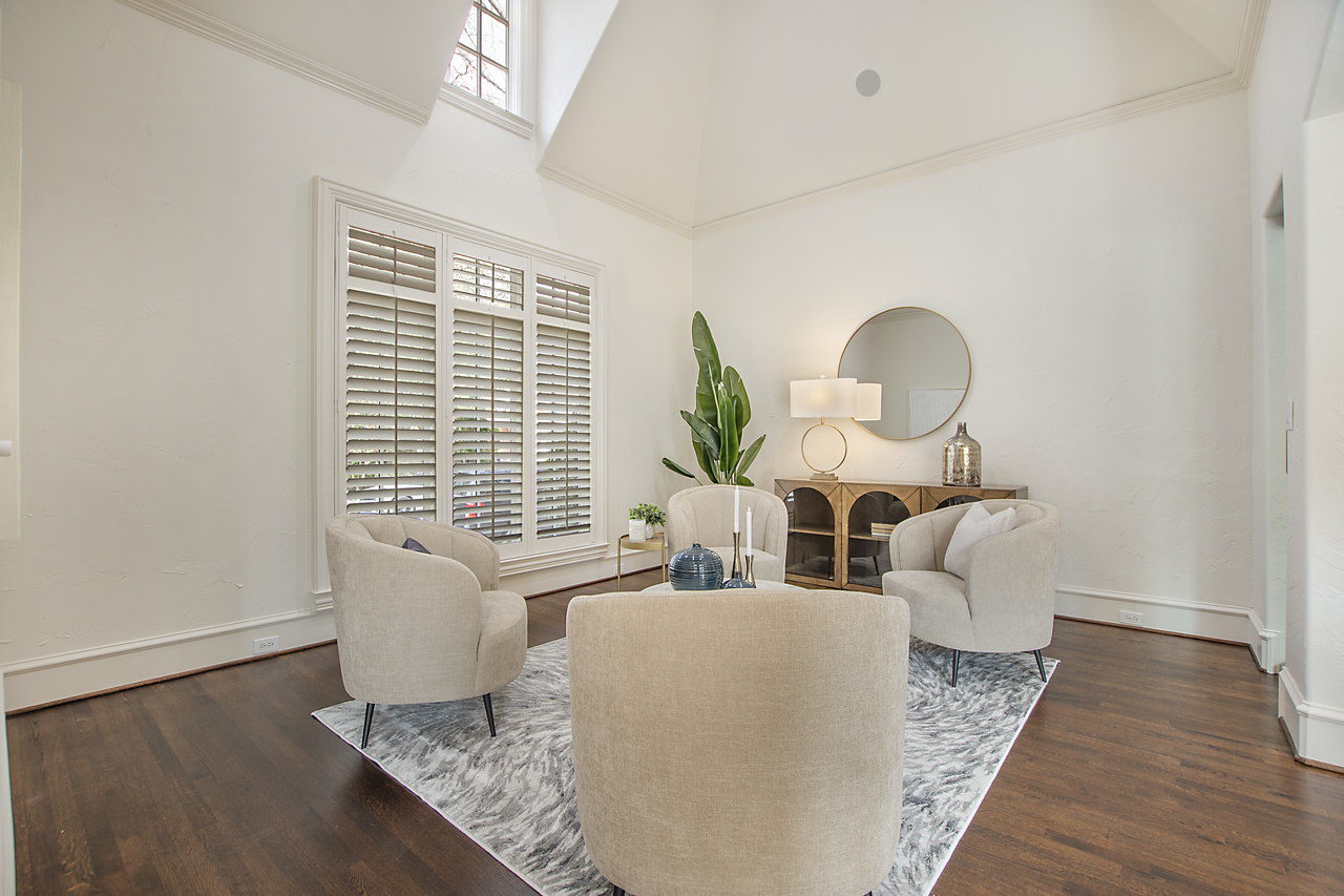 Elegant formal sitting room with sophisticated décor and refined staging, professionally designed by Model My Home—Dallas Fort Worth home staging and interior design experts.