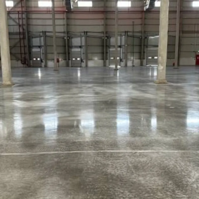 Garage with blue and gray metallic epoxy flooring and Jeep