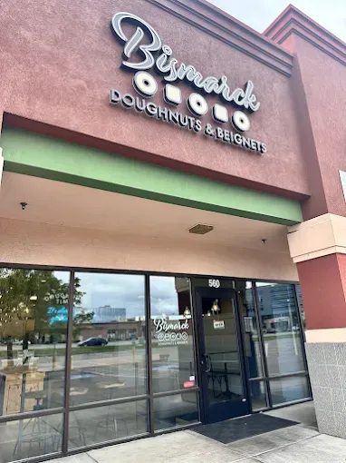 Bismarck Doughnuts bakery case and storefront displaying gluten-free products