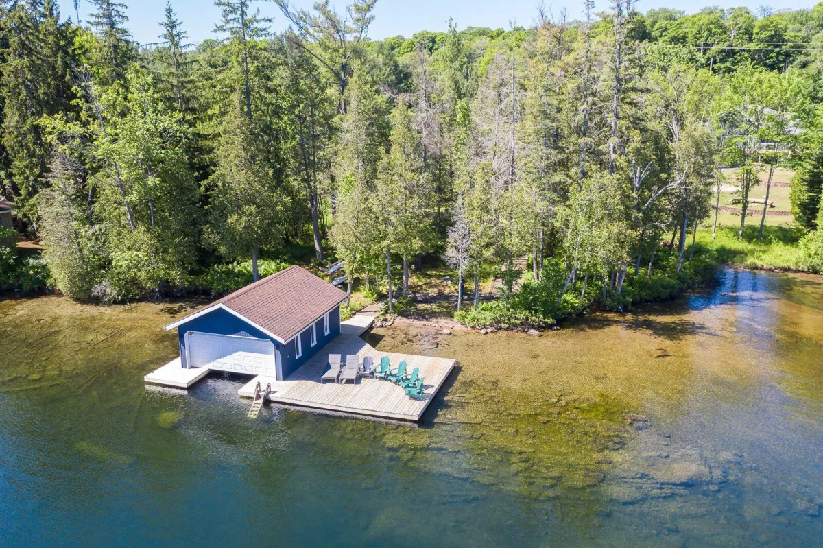 Muskoka waterfront cottage at sunset — summer 2026 season guide by Homeseeker Vacation Homes