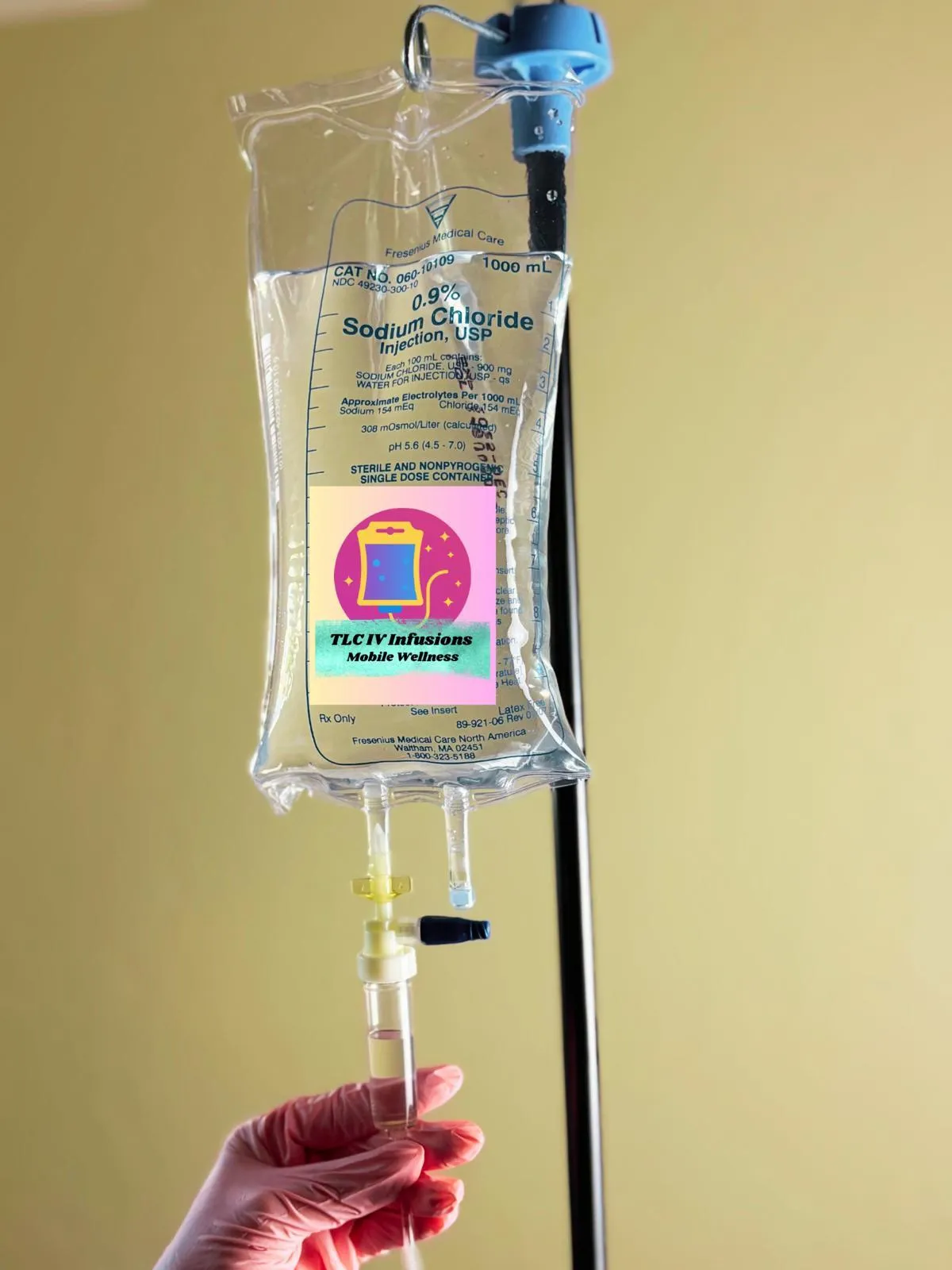 Nicotinamide Riboside Chloride vial held by a person, highlighting mobile infusion services for energy and wellness at TLC IV Infusions.