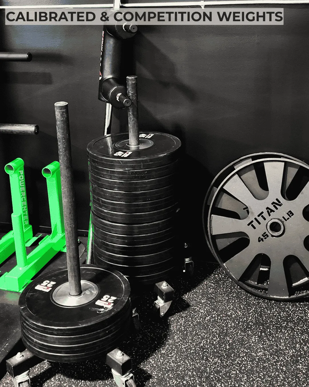 Premium Rogue calibrated kilo plates and competition weight trees inside a 24/7 access gym near Waterbury, CT.