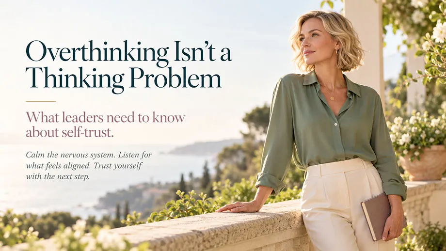 Confident female leader standing outdoors by the coast, representing self-trust, calm decision-making, nervous system regulation, and moving beyond overthinking.