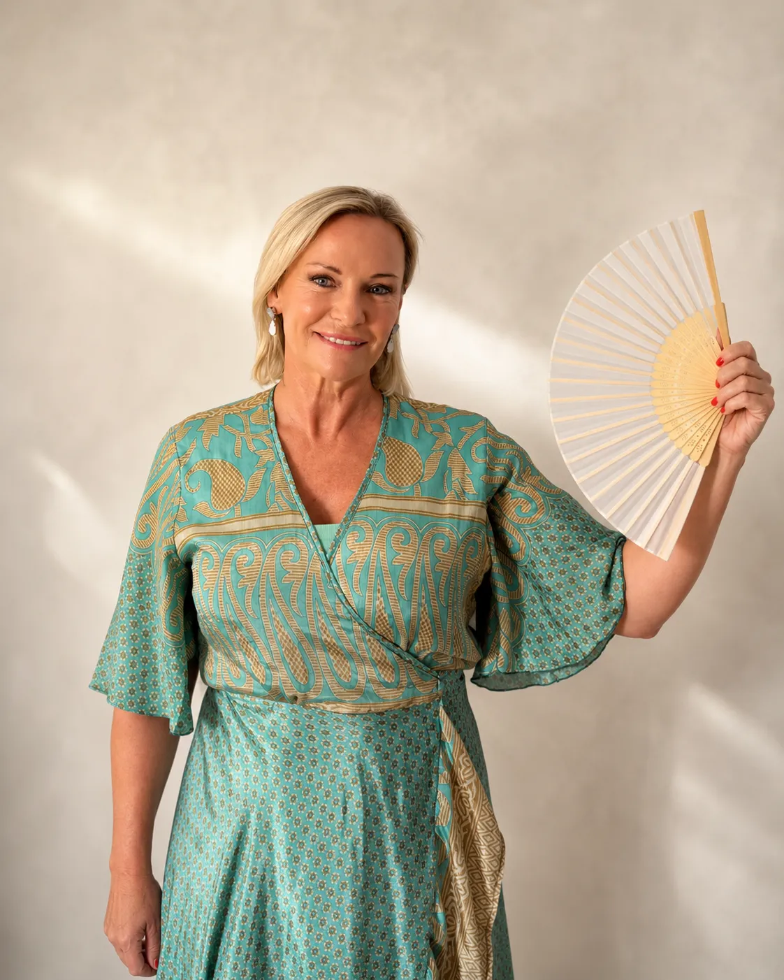 Head-and-shoulders portrait of Audrey Spearing, wellness entrepreneur and speaker (smiling).