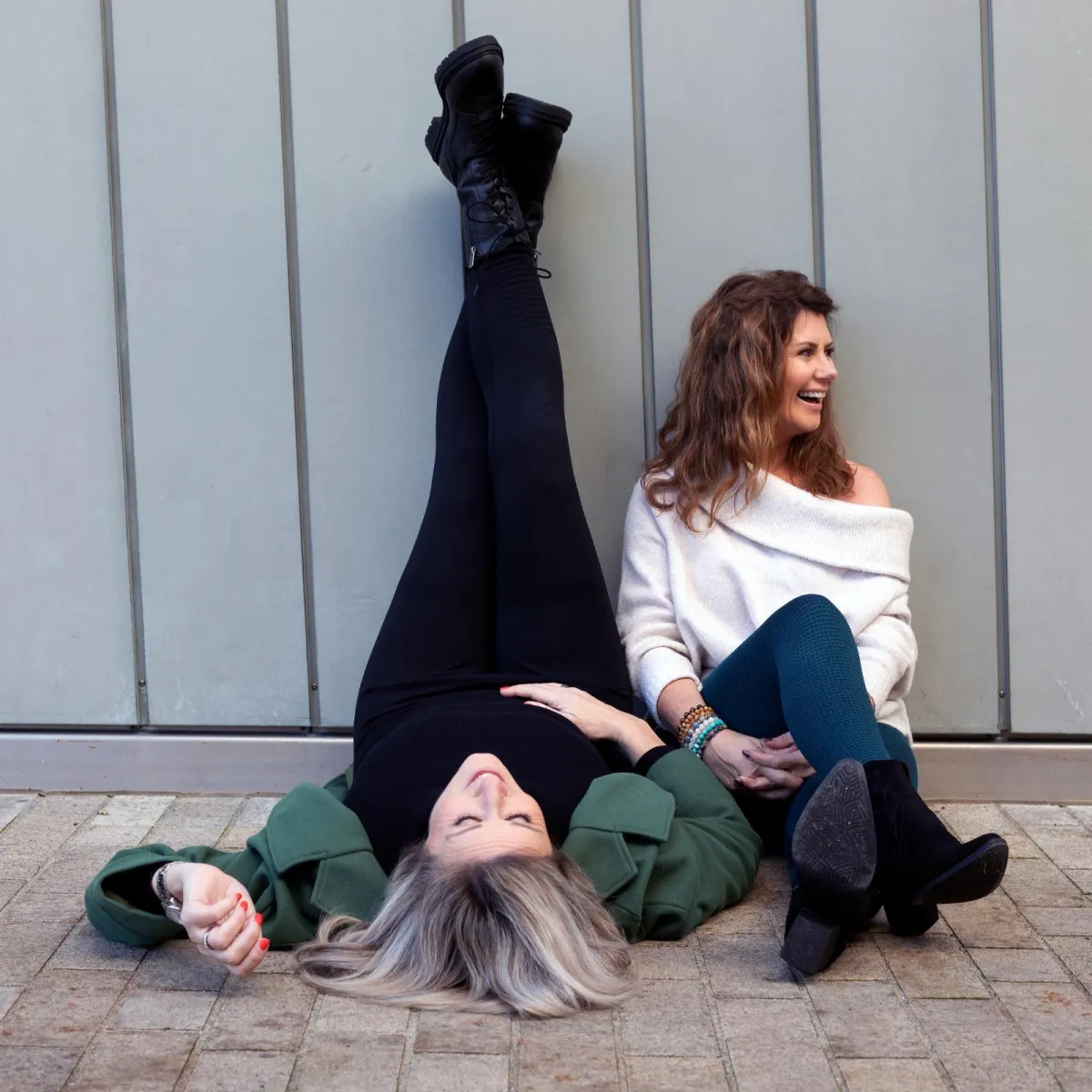 Women engaging in a grounded somatic breathwork practice