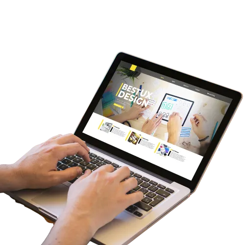 Designing a roofing website on a laptop