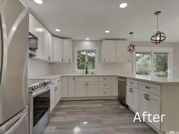 The after of the basement kitchen remodel. The brick wall has been removed and has been replaced with a peninsula