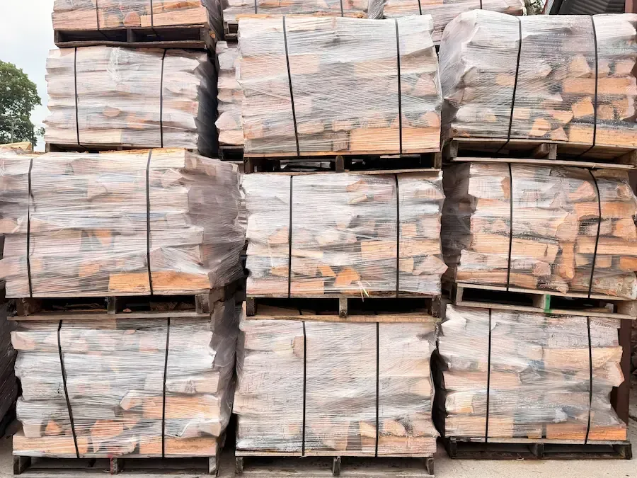 Stacked Dank firewood logs ready for residential or commercial use