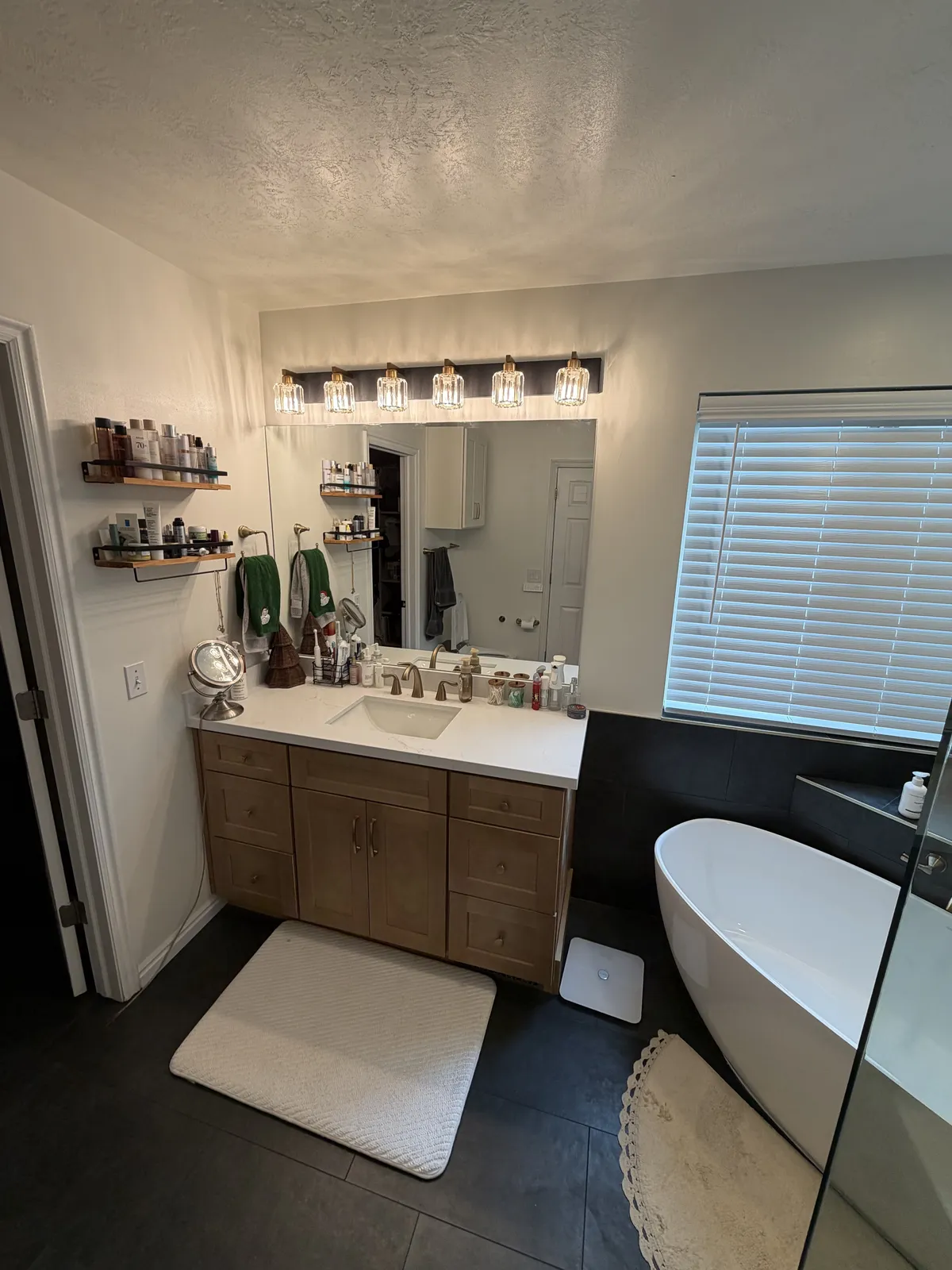 Wood vanity and freestanding tub