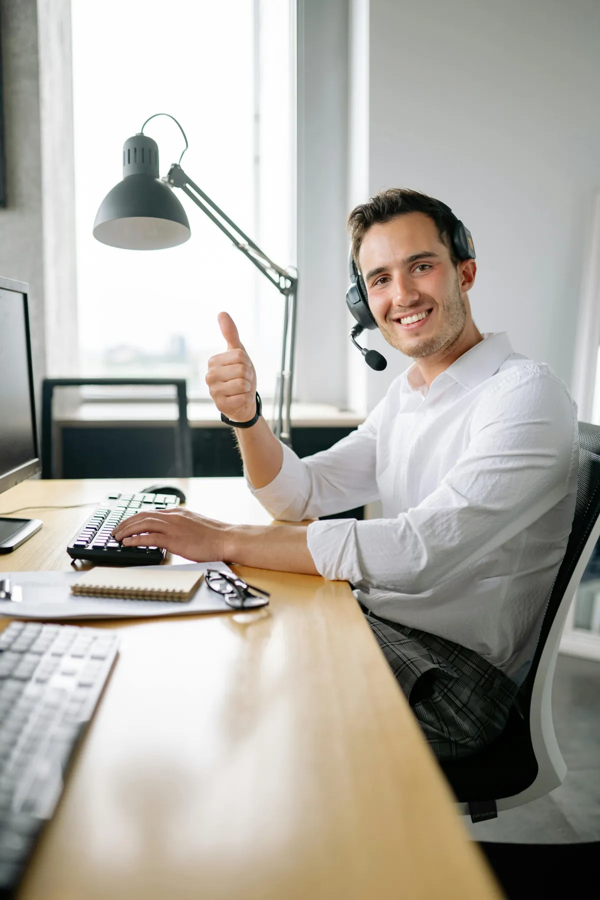 Young Man Happy because of his Dental Plan