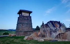 Multi-level deck with hot tub in Leyden Rock neighborhood
