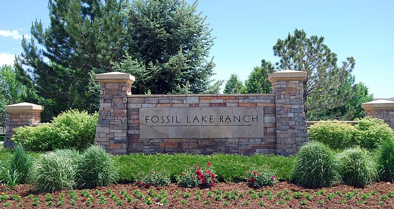 Composite deck with pergola and seating in Fossil Lake Ranch Fort Collins