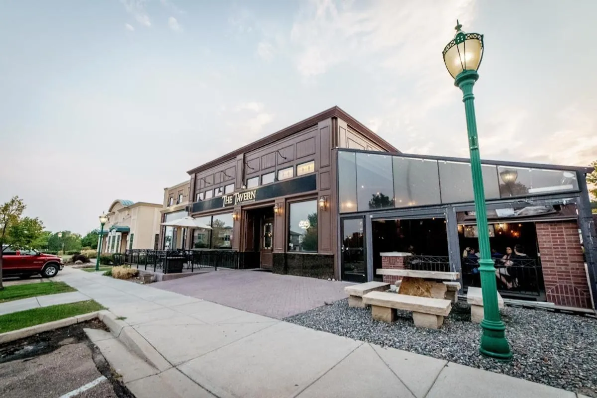 Pressure-treateComposite deck with pergola and seating in St. Michael’s Greeleyd deck with railing for rental property in University District Greeley