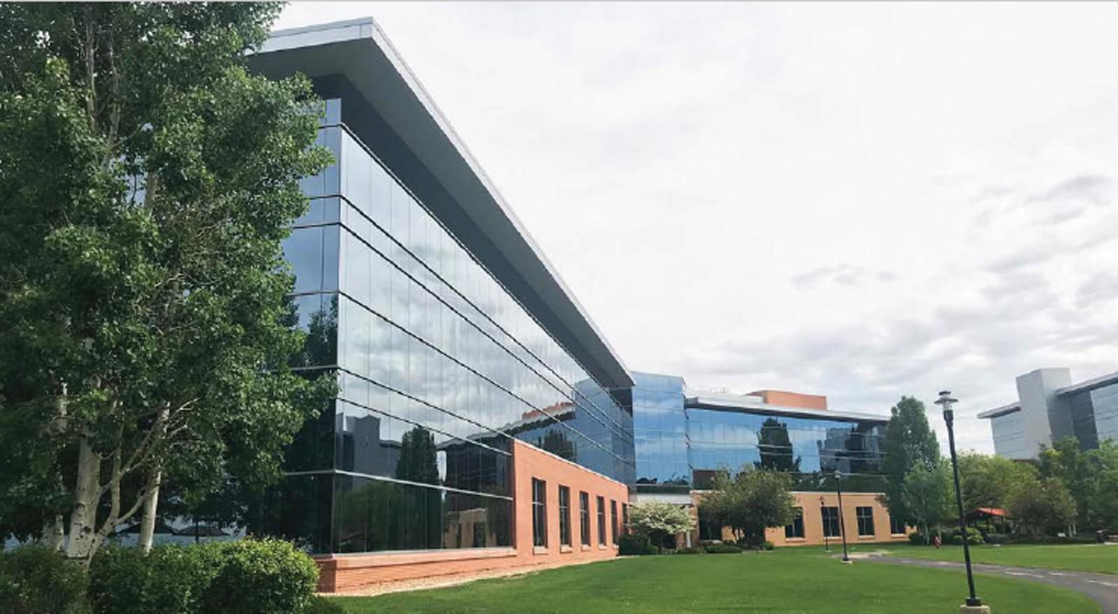 Multi-level cedar deck with hot tub surround in Promontory Greeley
