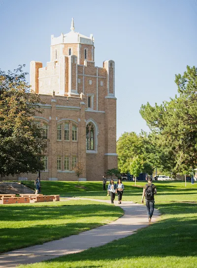 Pressure-treated deck with railing for rental property in University District Greeley