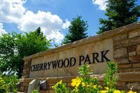 Cedar deck with pergola and railing in Cherrywood Park Thornton