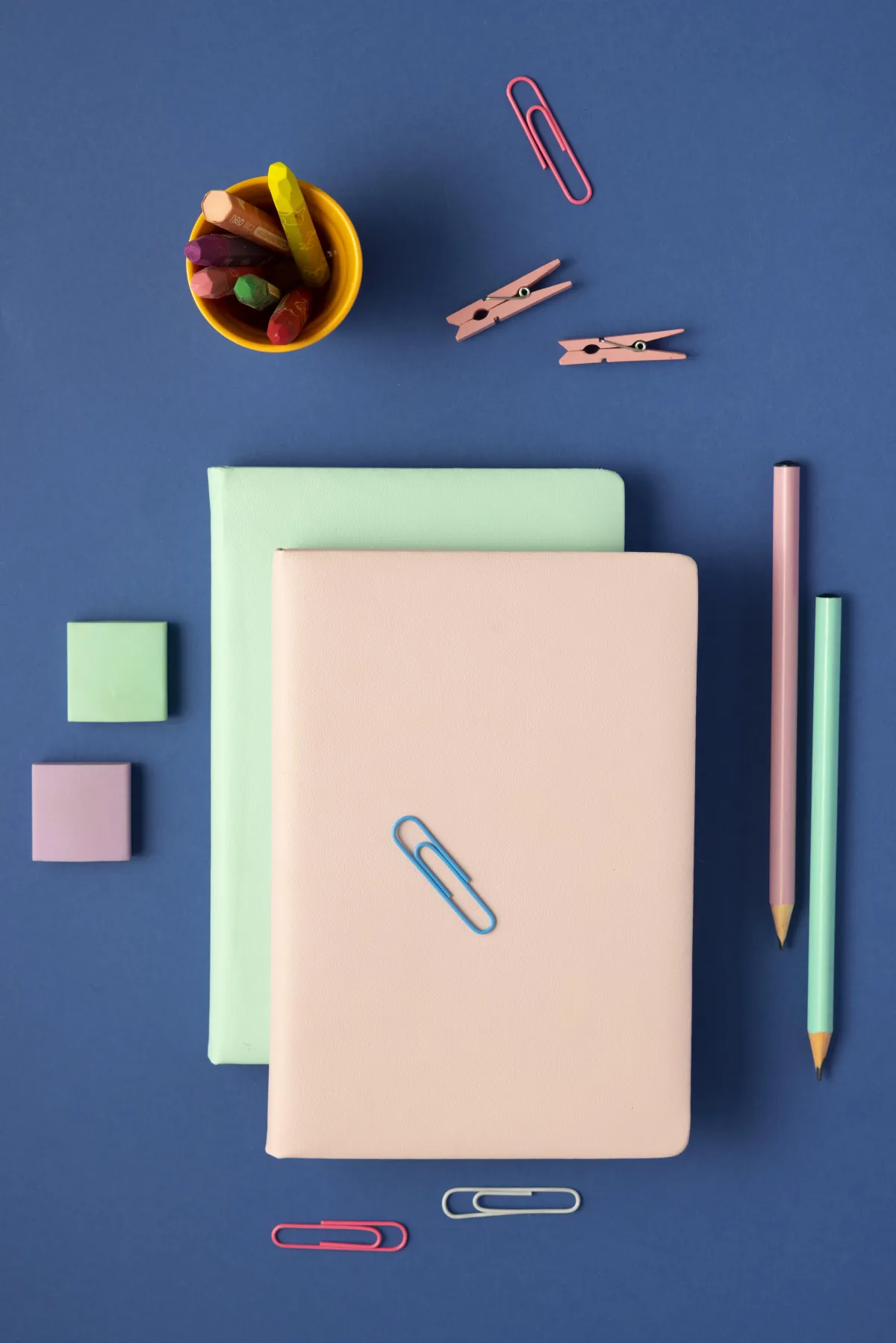 three headphones sitting on a wall next to each other
