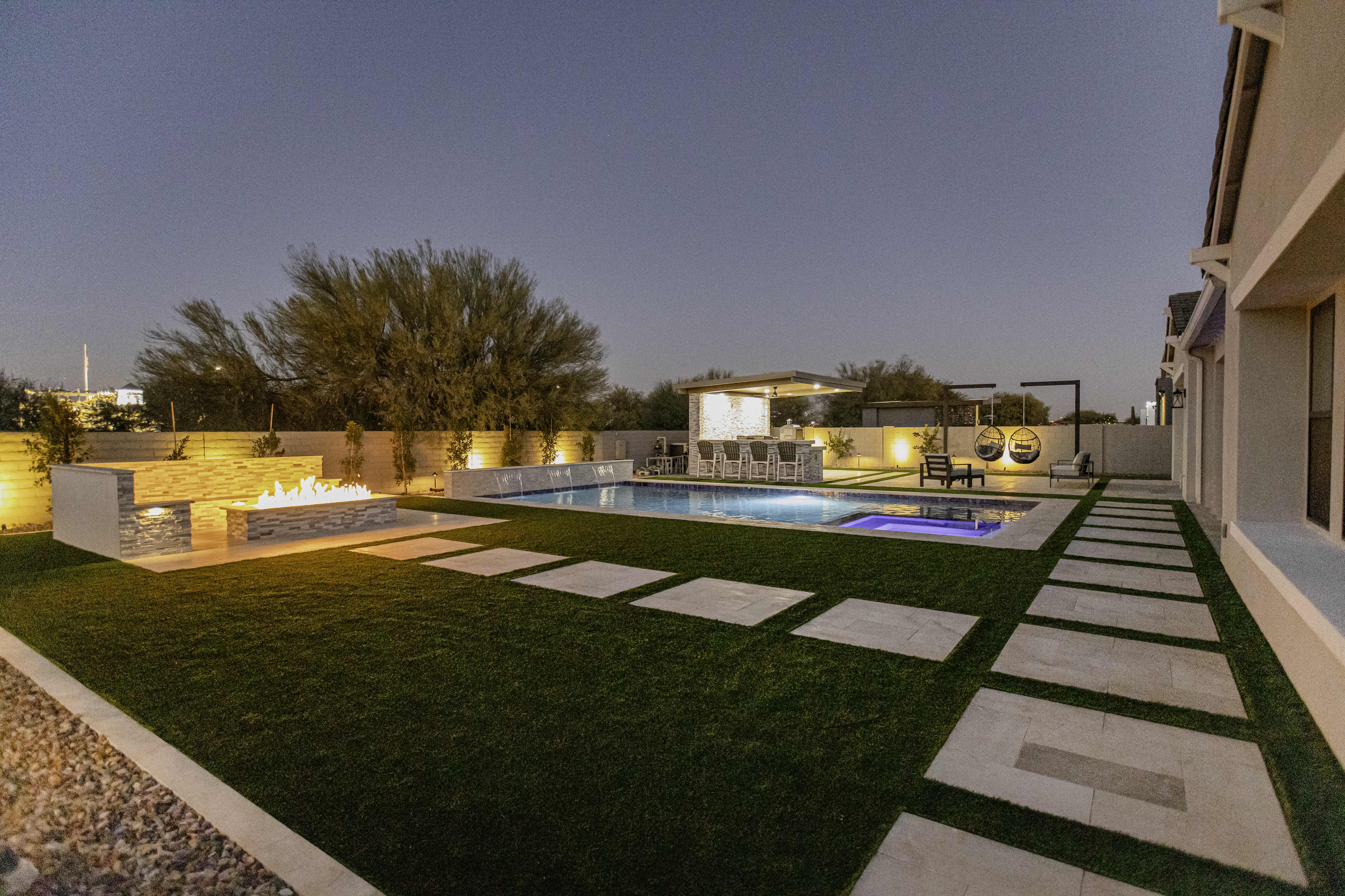 green trees near swimming pool during daytime