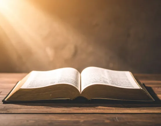 Open scriptures with light representing gospel content
