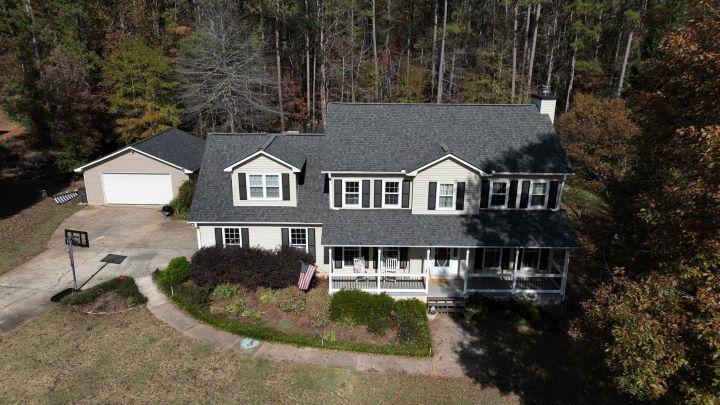 Classic home roof replacement project in Covington, Georgia by Elite Roofing & Outdoor Construction — durable shingle roofing upgrade