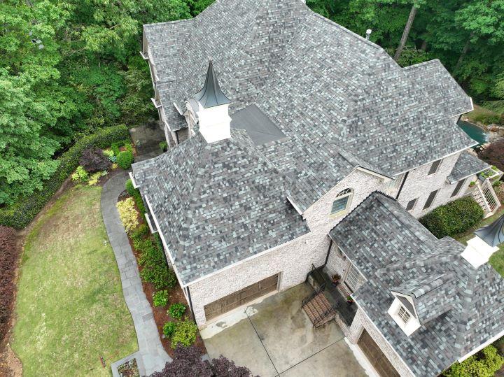 Luxury residential roof installation in Fayetteville, GA by Elite Roofing & Outdoor Construction — asphalt shingles with detailed roofline design