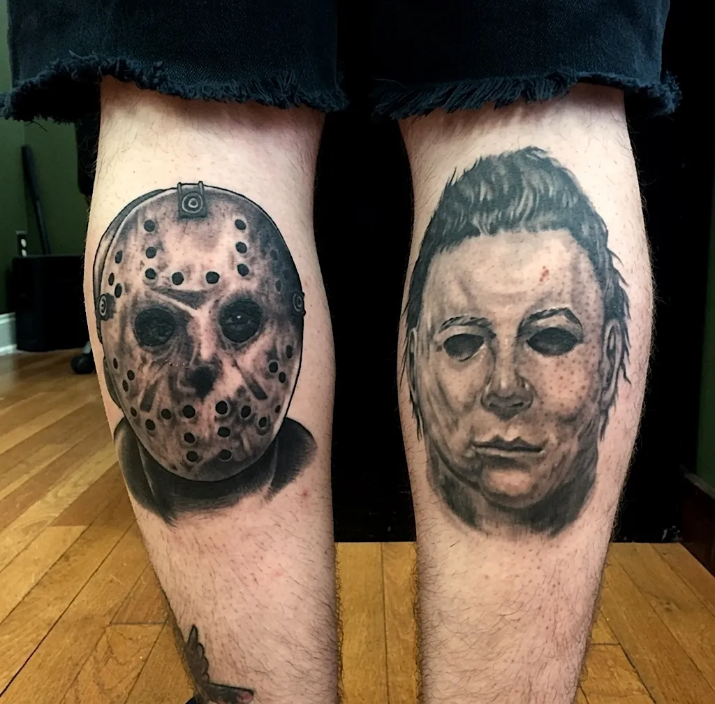 Jason Voorhees hockey mask and Michael Myers mask tattoos on the calves