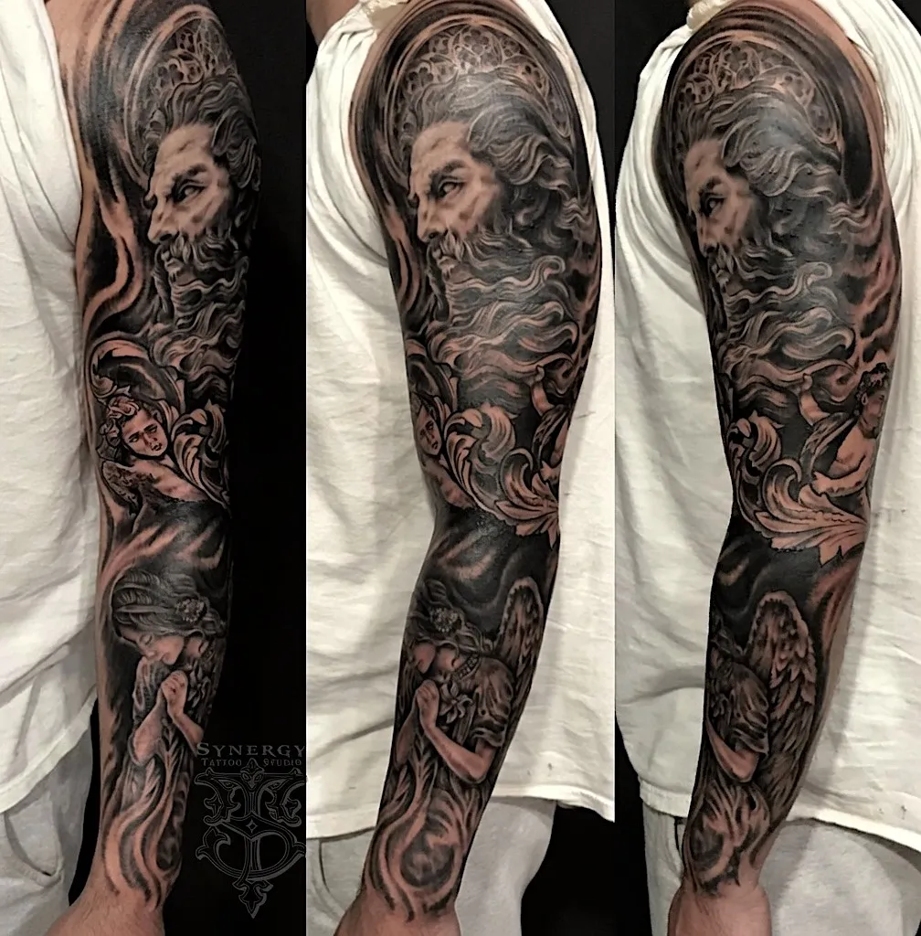Black and grey portrait tattoo sleeve with roses and flowing ornamental details