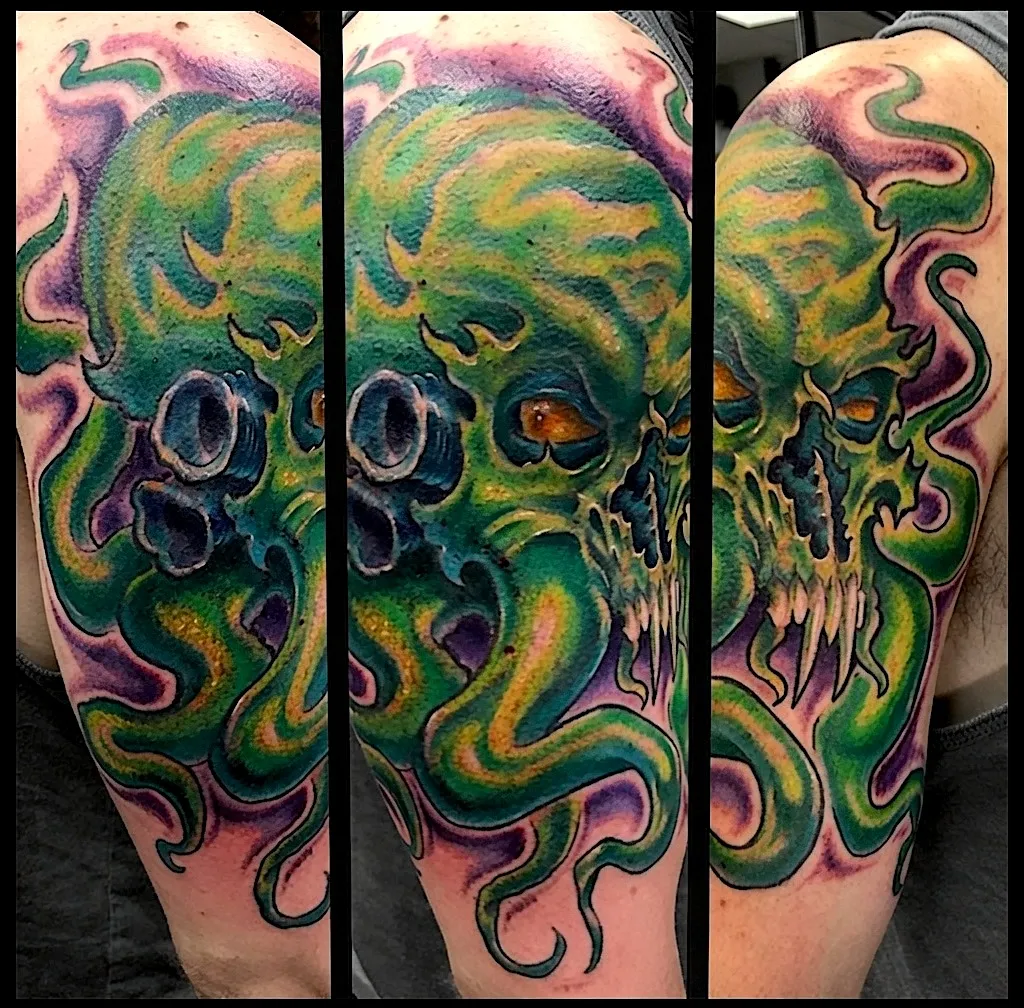 Green and purple skull tattoo with curling organic shapes