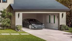 Elegant premium Tesla Solar Roof with sleek new 2026 all-black Tesla Solar Panels on a beautiful modern home in Payson Utah featuring clean professional installation by Ask Solar Mike Tesla certified experts