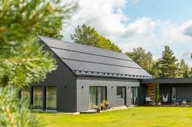 Sleek black 2026 Tesla Solar Panels elegantly installed on a luxurious Sandy home with modern architecture and scenic mountain backdrop