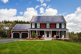 Sleek black 2026 Tesla Solar Panels elegantly installed on a luxurious modern Layton home with clean architecture and stunning mountain views