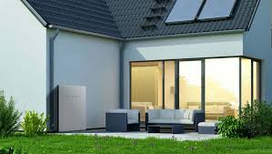 Premium Tesla Solar Roof with sleek black tiles crowning a luxurious Lehi home featuring elegant modern architecture and stunning Wasatch Mountain views