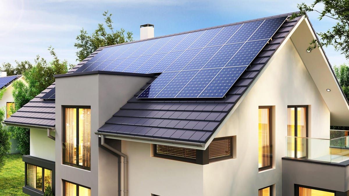 Premium Tesla Solar Roof with sleek black tiles and elegant 2026 black Tesla Solar Panels perfectly installed on a luxurious Heber mountain estate with sophisticated alpine architecture and breathtaking Wasatch Mountain views