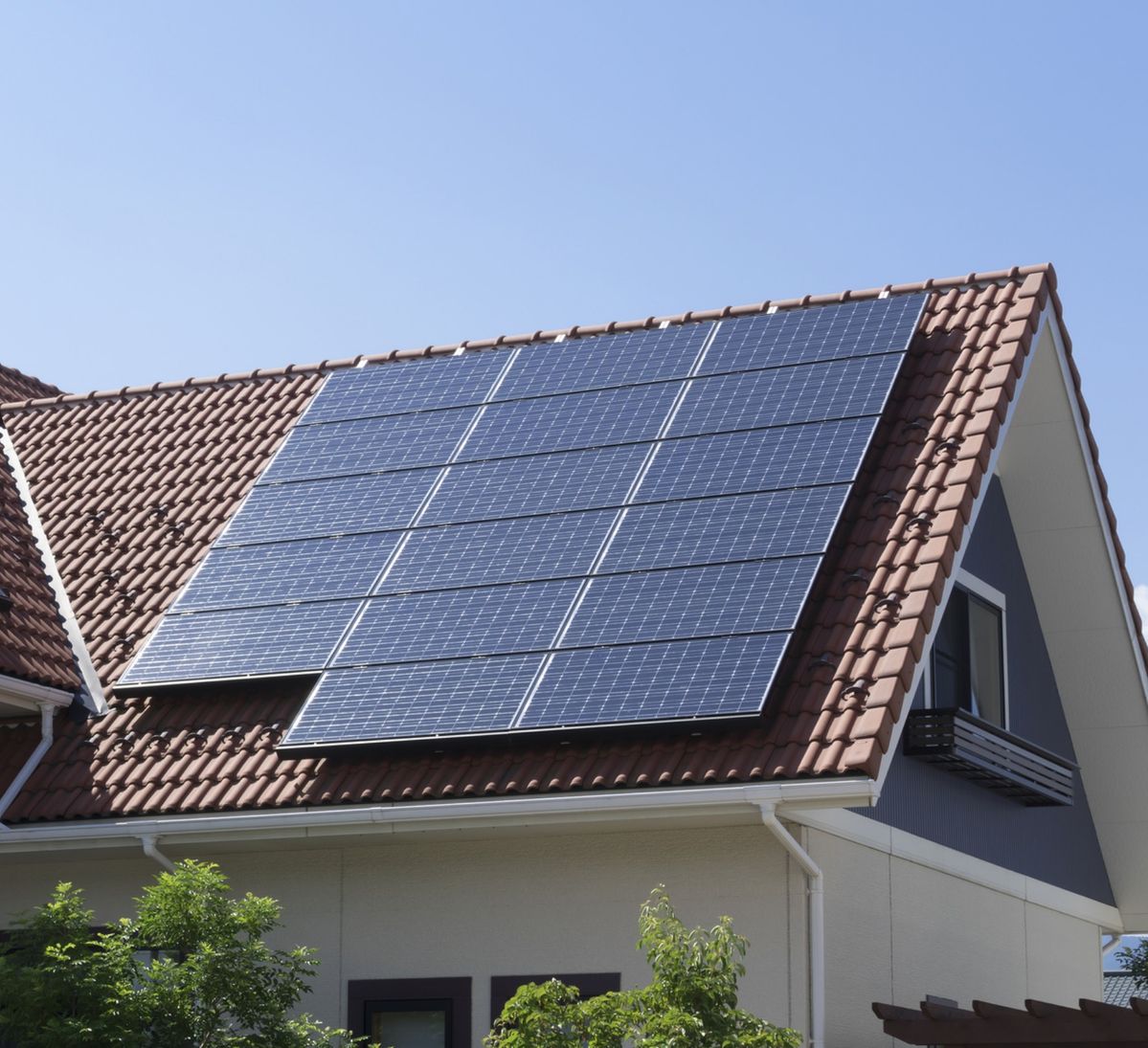 Elegant premium Tesla Solar Roof with sleek black tiles and stunning 2026 black Tesla Solar Panels gracefully installed on a luxurious Heber mountain home featuring modern architecture and breathtaking Wasatch Range views