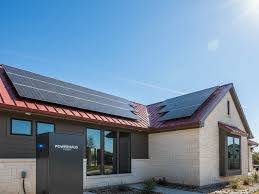 Luxurious premium Tesla Solar Roof with sleek black tiles and stunning new 2026 black Tesla Solar Panels elegantly installed on a distinguished Layton luxury home featuring modern architecture and stunning Wasatch Range views