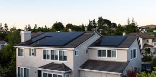 Luxurious premium Tesla Solar Roof with sleek black tiles and stunning new 2026 black Tesla Solar Panels elegantly installed on a distinguished Draper estate featuring sophisticated modern architecture and breathtaking Wasatch Range views