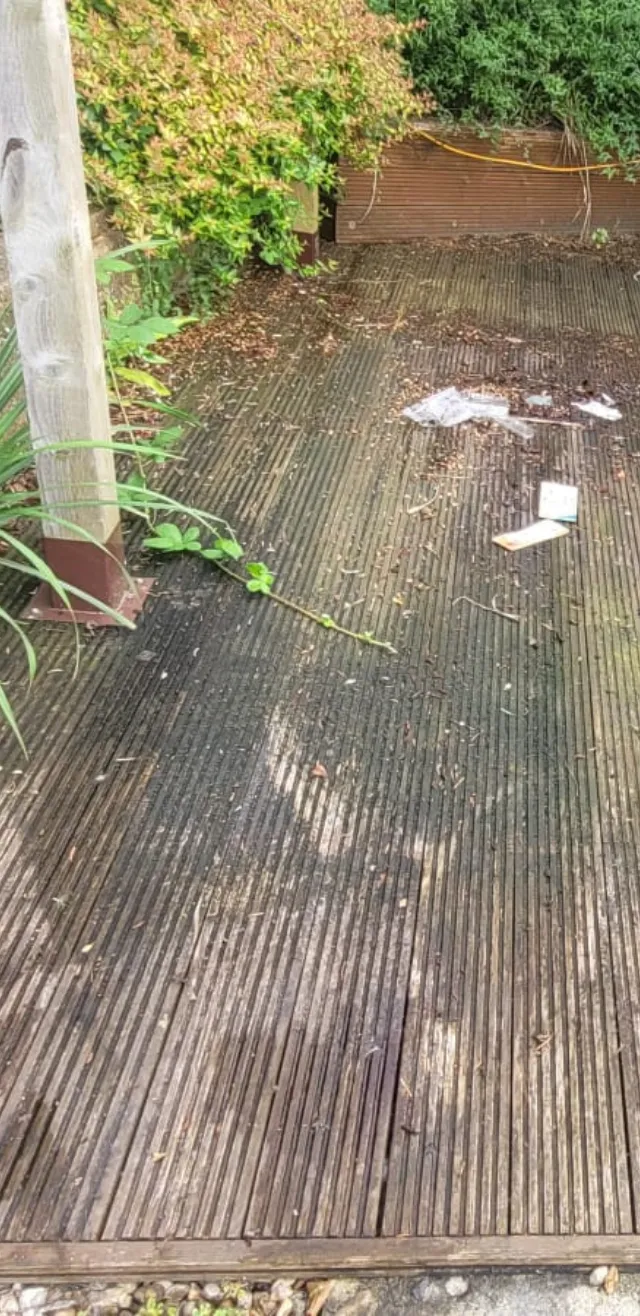A photo of decking in Cardiff before we jet washed it