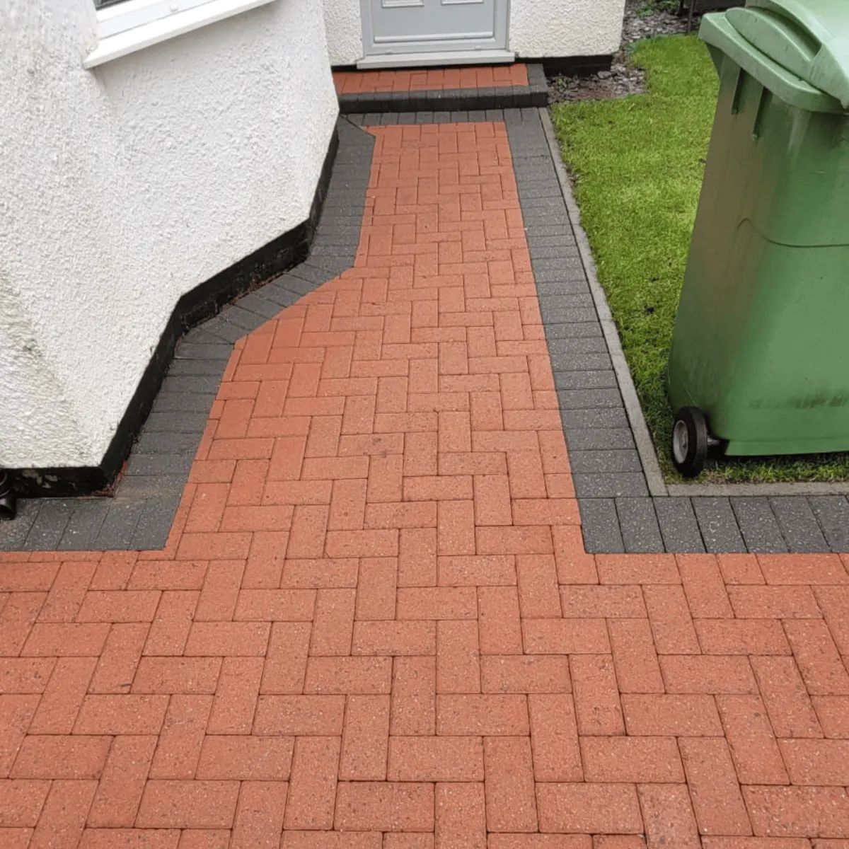 A path at the front of a house that we jet washed in Cardiff