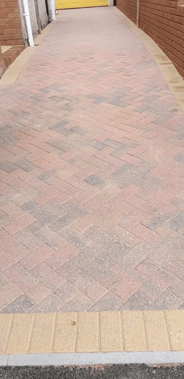 A long driveway in Cardiff after we jet washed it
