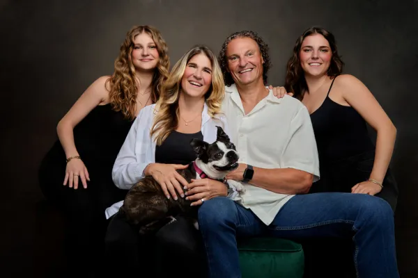 Emotional family portrait photographed in studio lighting by Janice Smith Photography