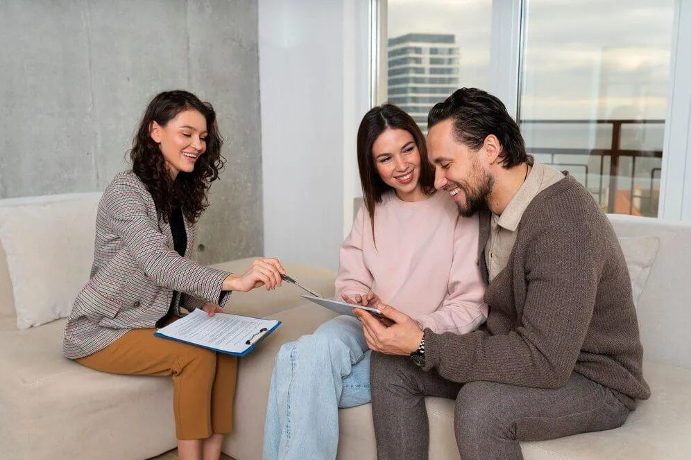 Couple happy after getting help about their insurance coverage