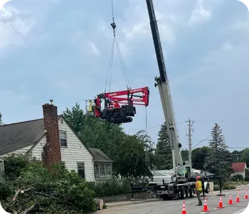 Crane Over House for Back Yard Work